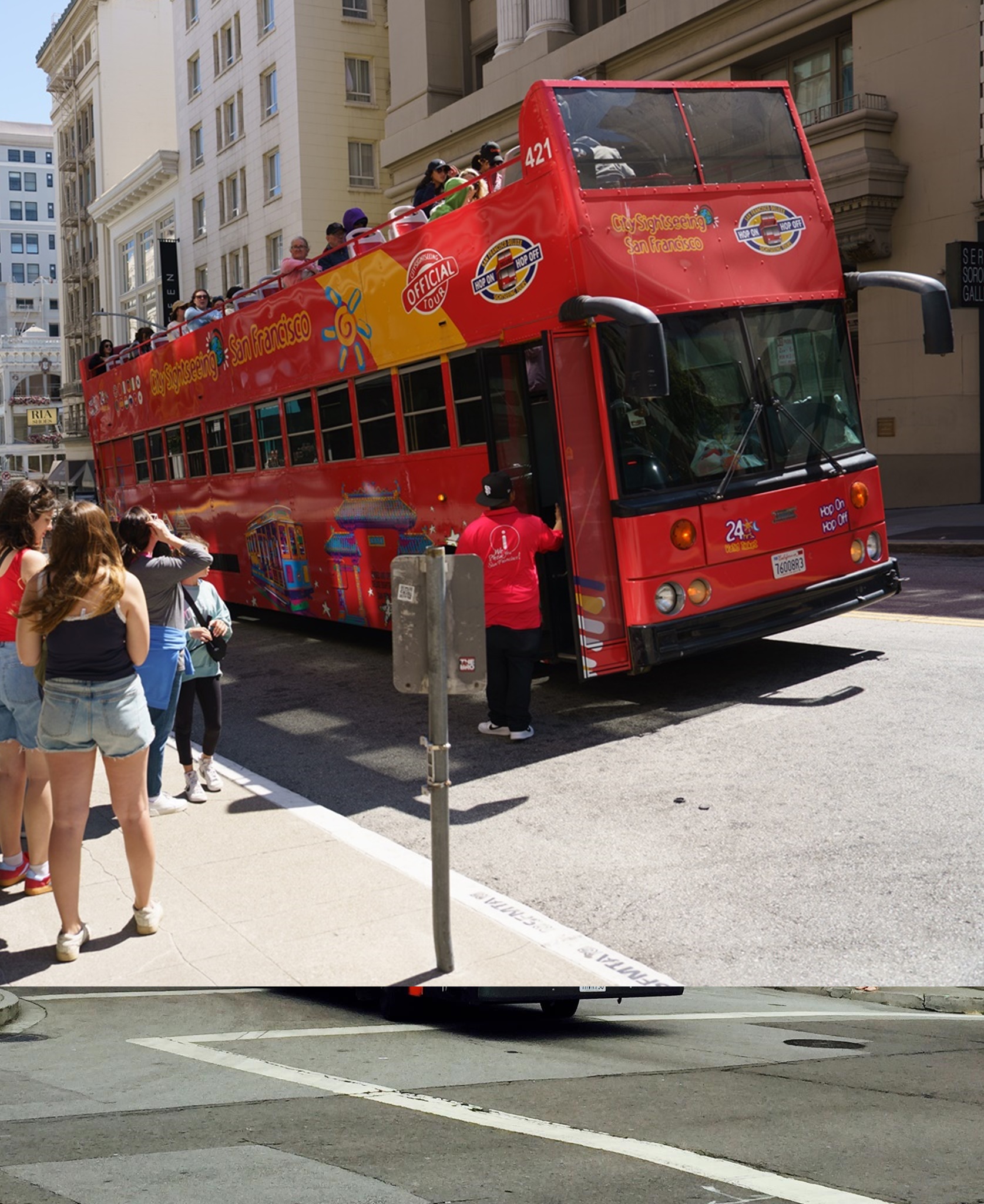 Happy riders aboard San Francisco Deluxe Sightseeing Open Top Bus